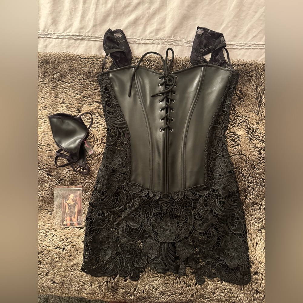 Black Lace Corset with matching thong. Never worn- with tags. Sexy!
